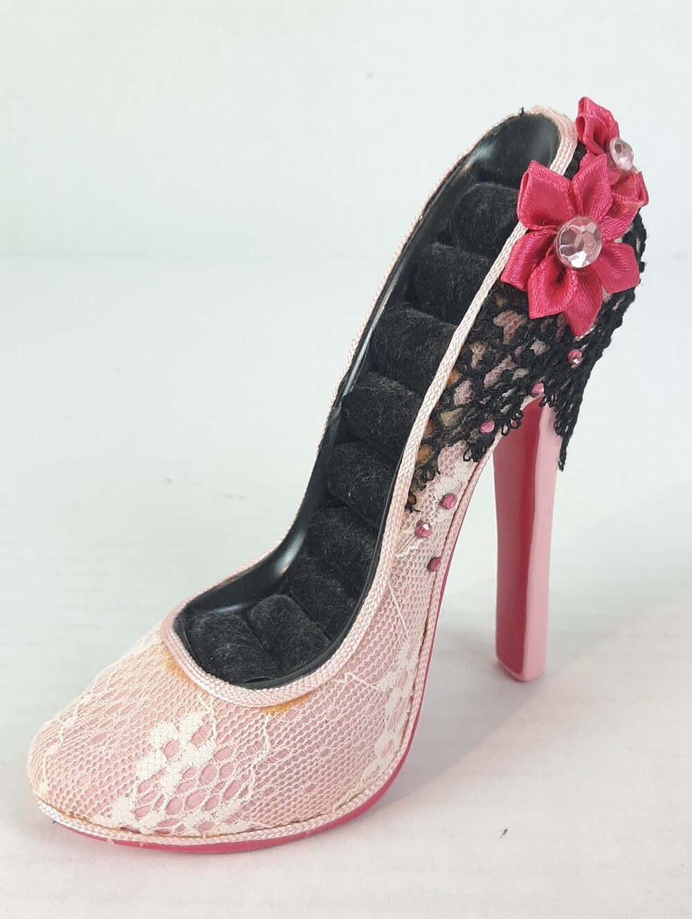 Pink with black and white lace detail high heel jewelry display